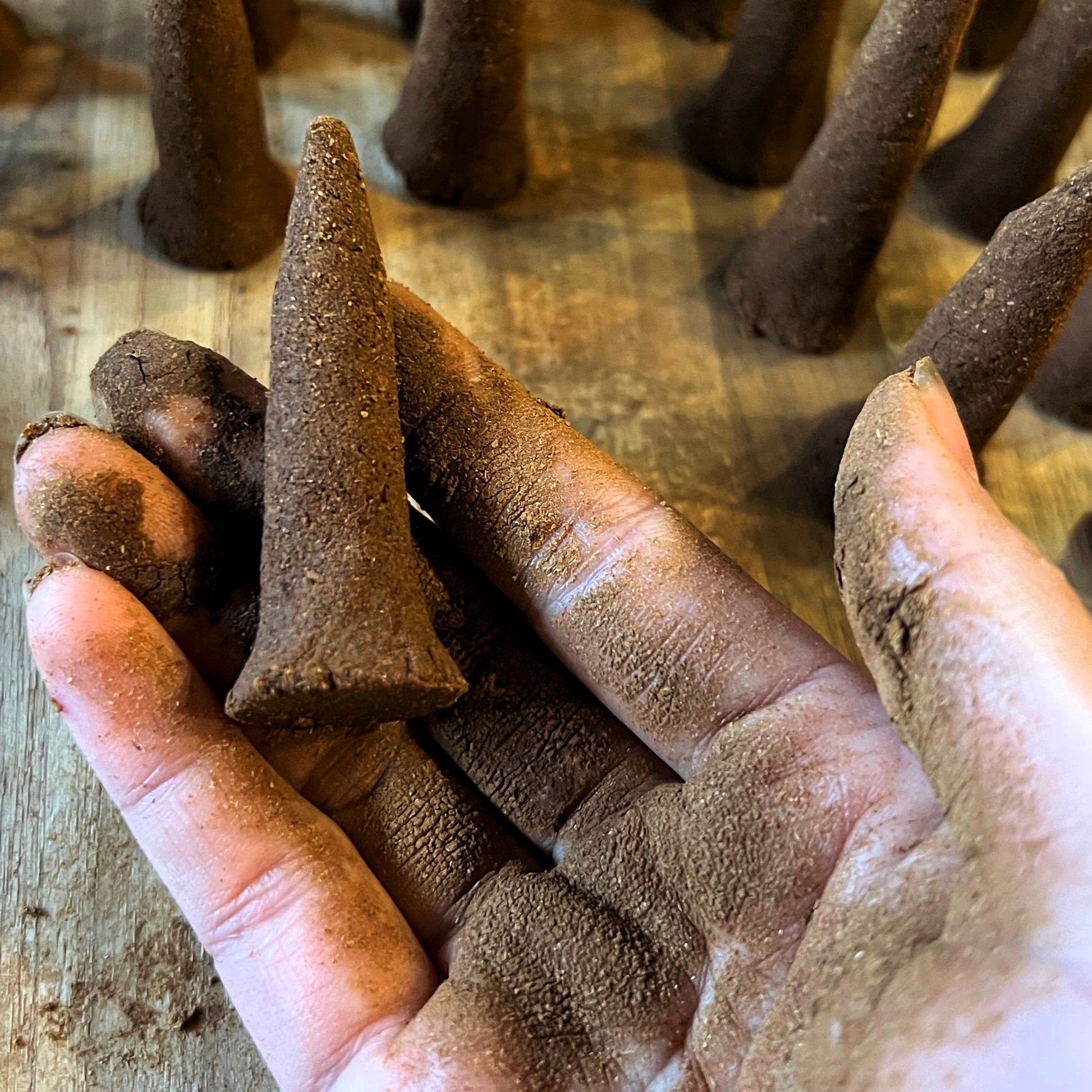 Cinnamon cone in the process of being made by hand.