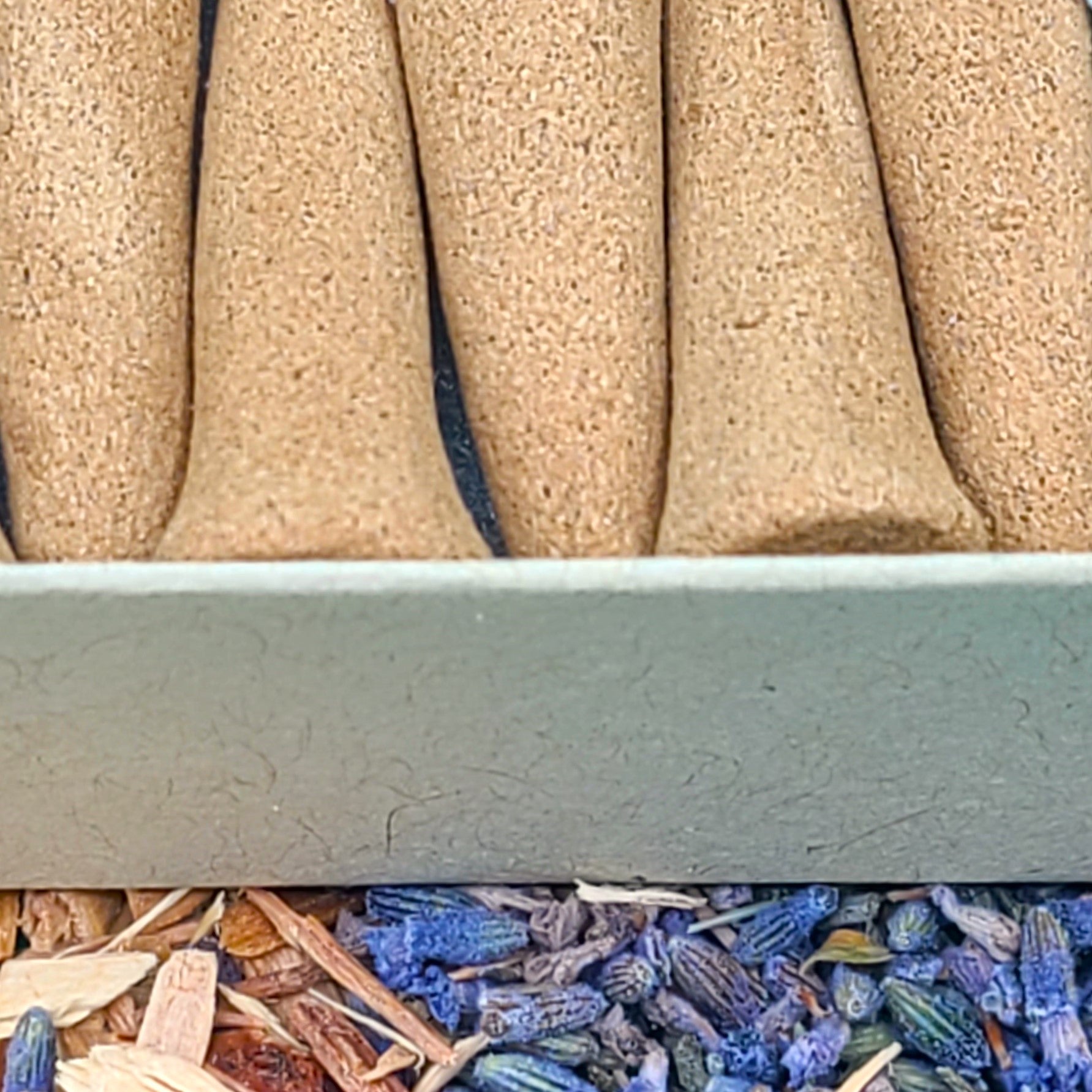 Close up detailed photo of French Lavender organic incense cones.