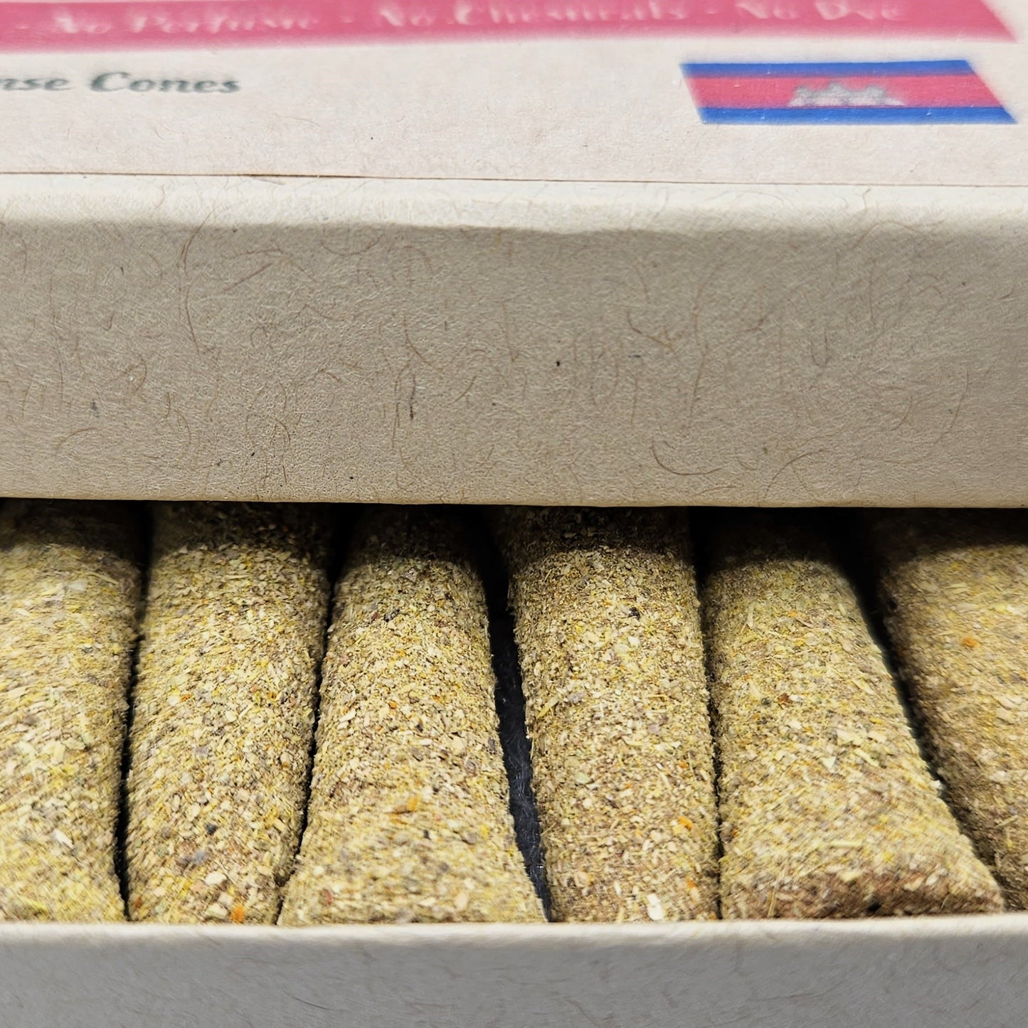 Close up detailed photo of Kheoun's Blend organic incense cones.