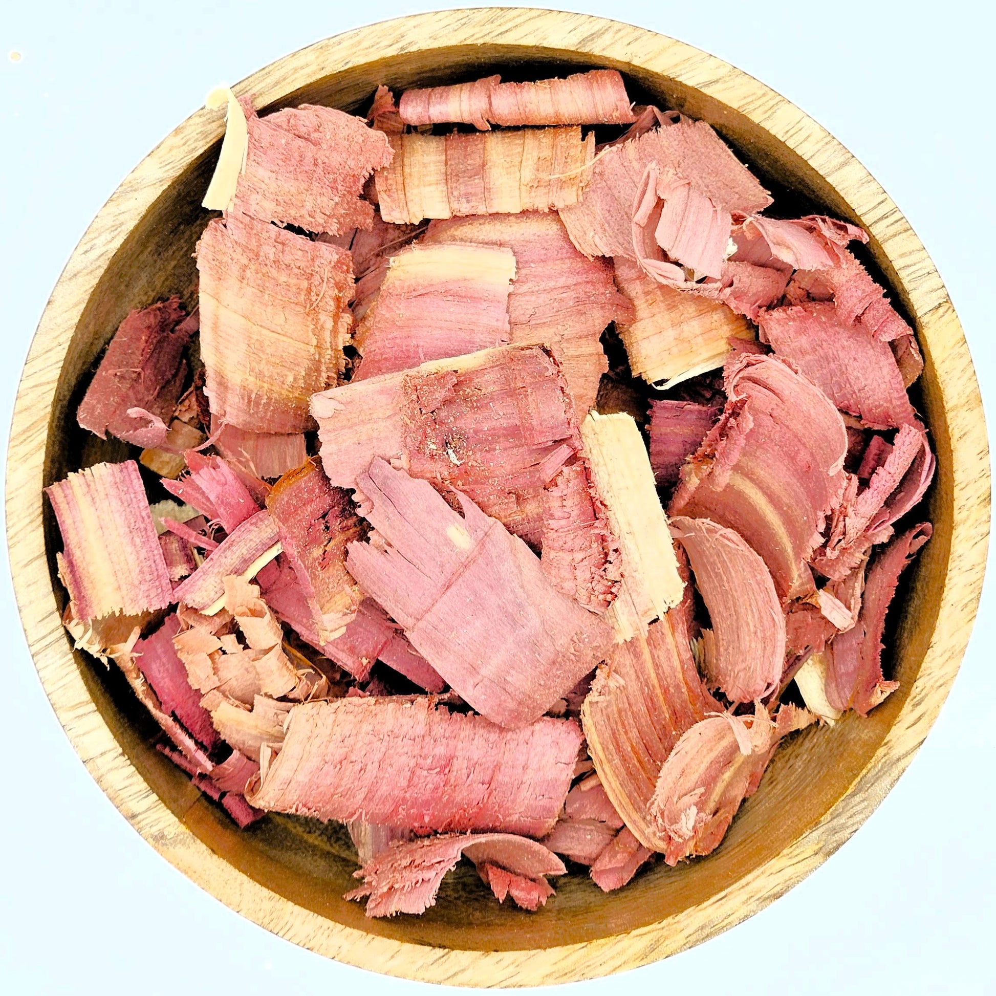 A bowl showcasing organic Red Cedar ingredients.
