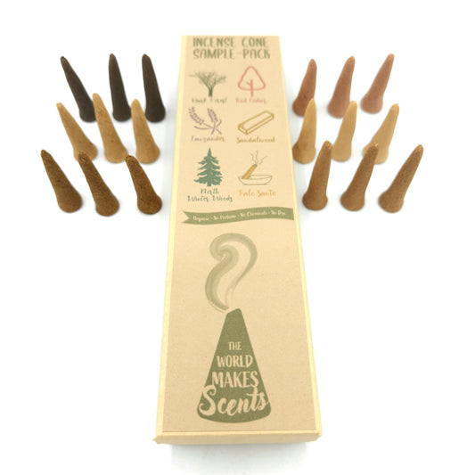 An 8 x 2 inch box with each type of cone labeled on the box.  Near the box are sample cones of each blend.