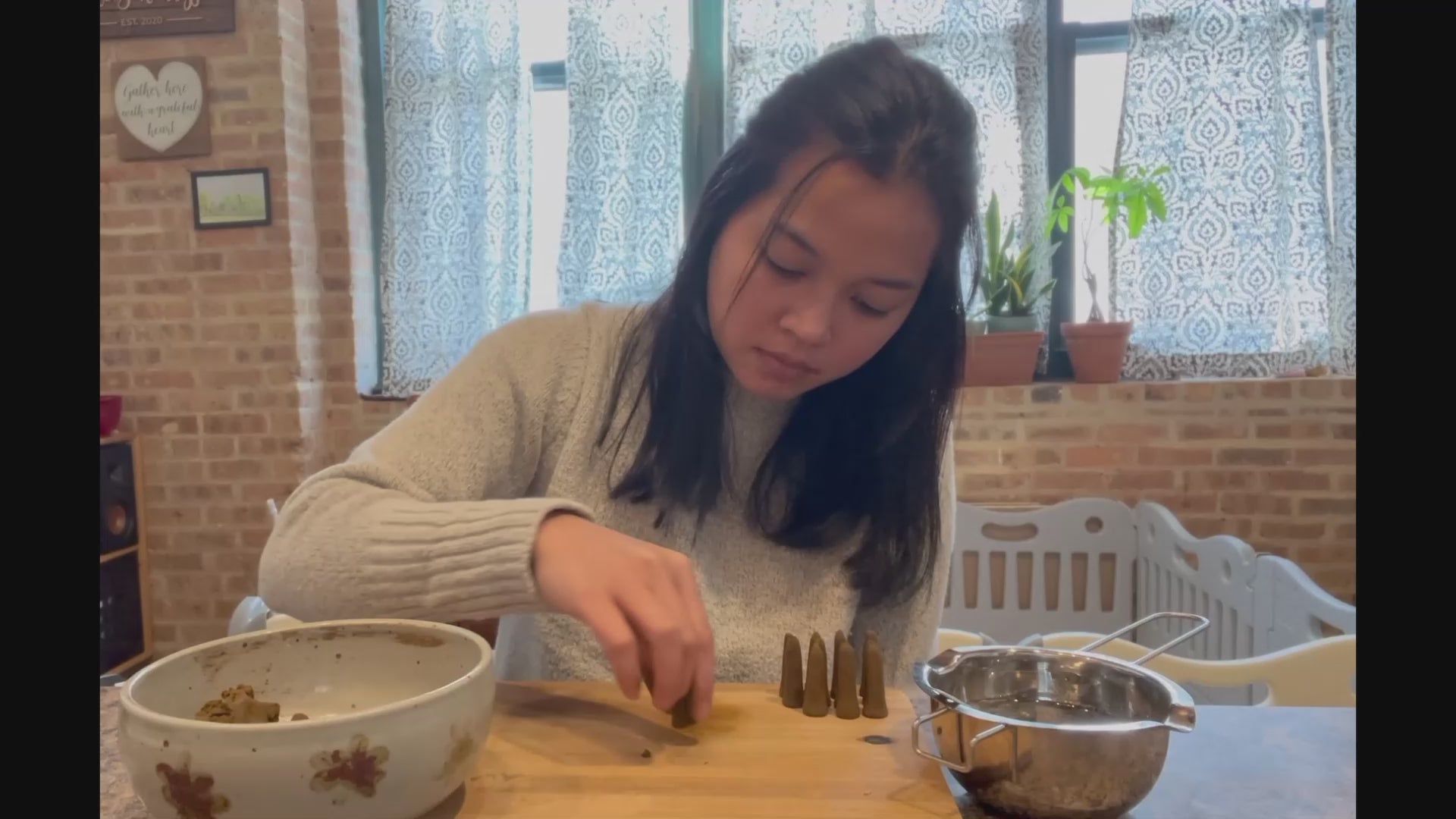 Making organic incense by hand.